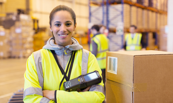 female warehouse worker with rf gun