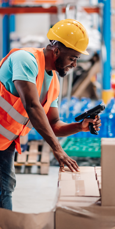 man scanning a box with an ar gun